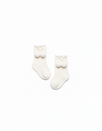 KNITTED SOCKS WITH POMPONS 