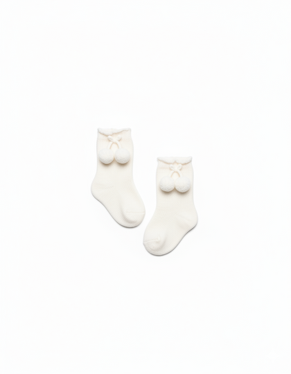 KNITTED SOCKS WITH POMPONS 