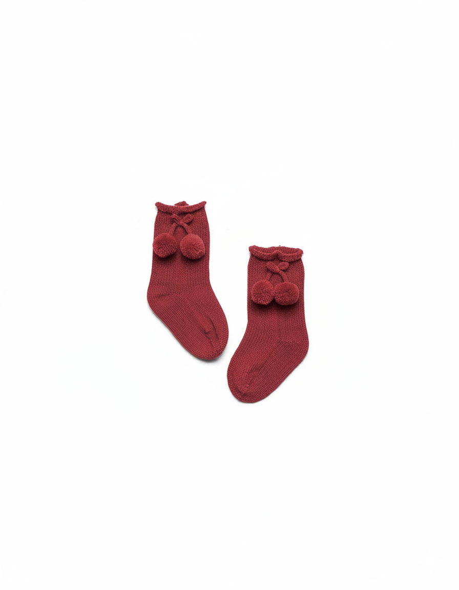 KNITTED SOCKS WITH POMPONS 