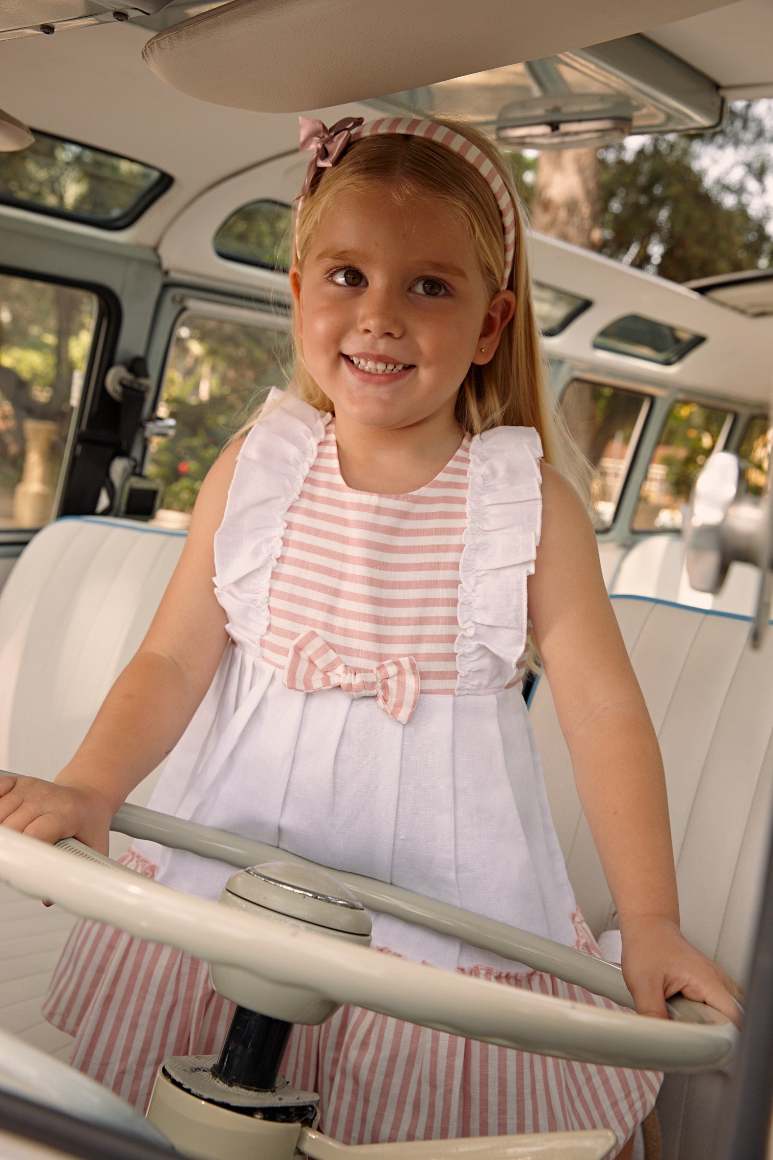 STRIPED DRESS WITH TWO RUFFLED LAYERS AND A BOW 