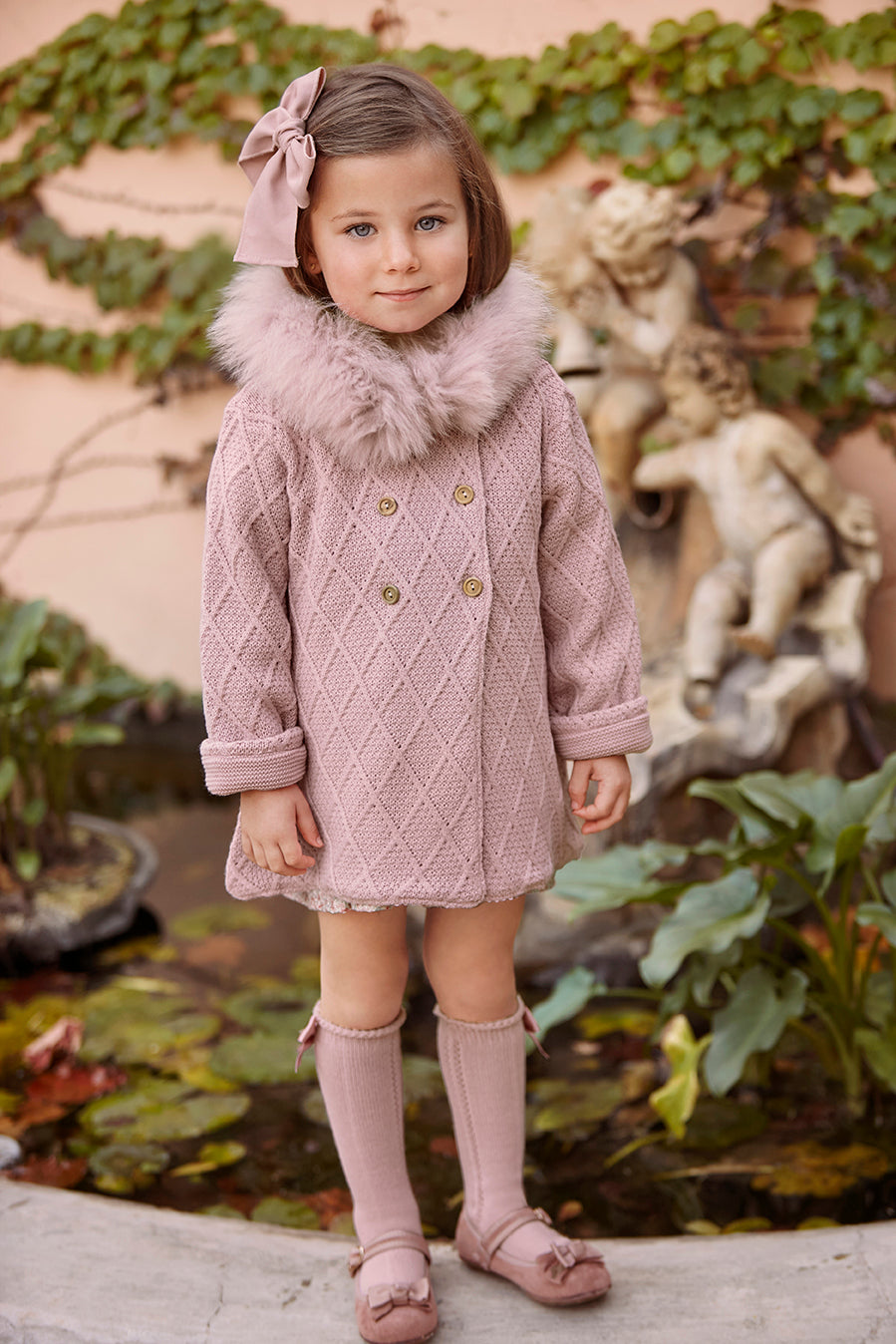 CAPPOTTO IN MAGLIA CON CAPPUCCIO IN PELLICCIA NATURALE