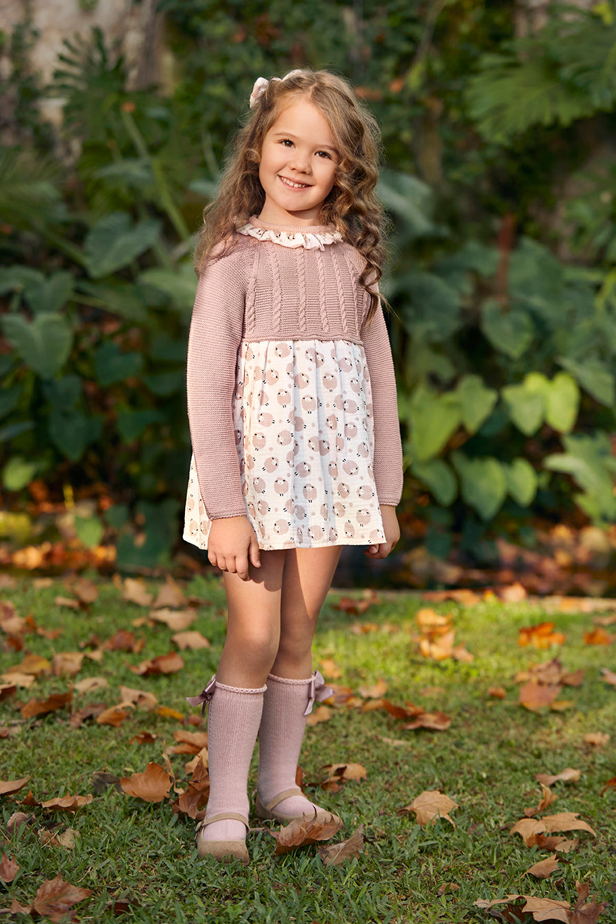 ABITO IN MAGLIA CON TRECCE DI PECORA