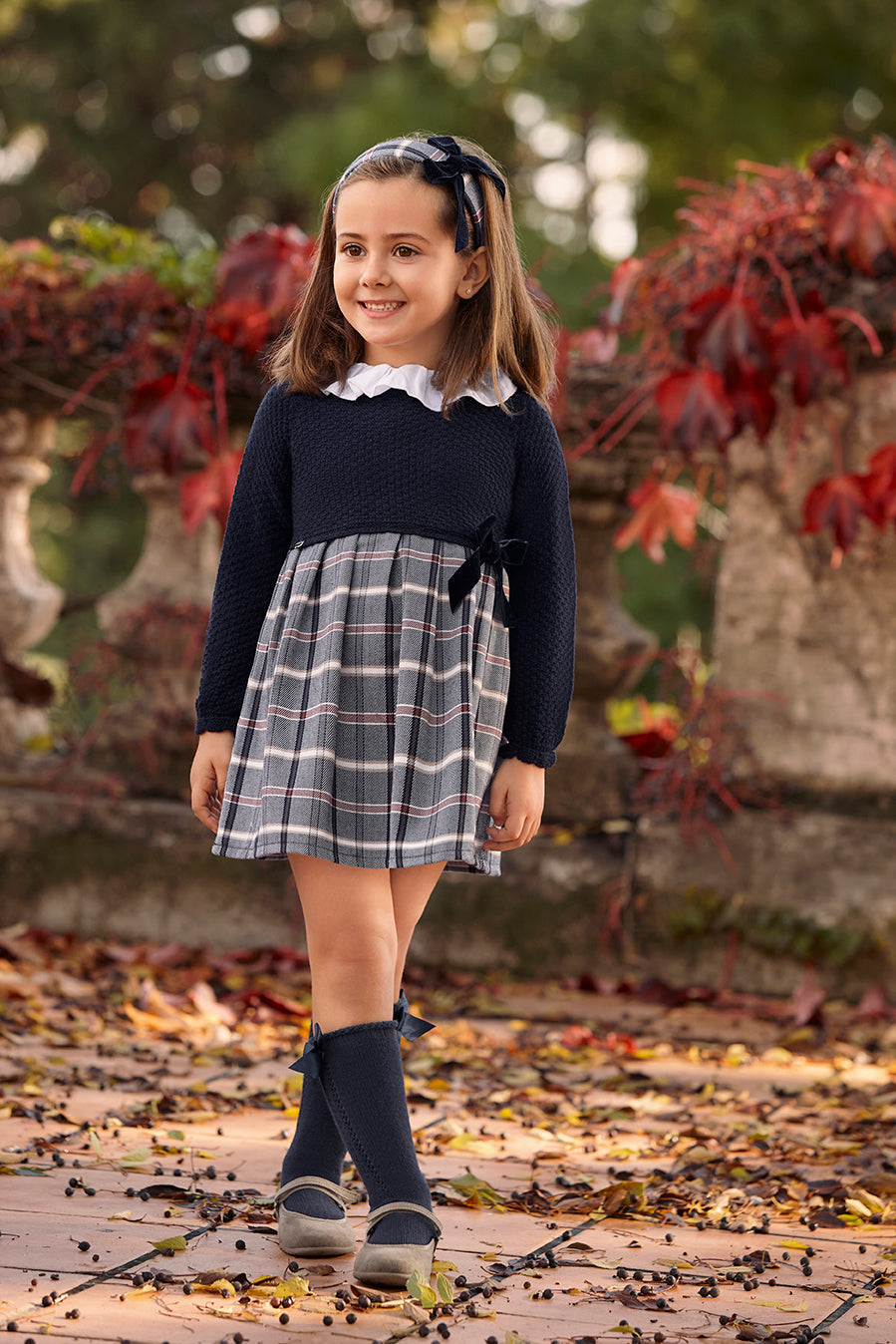 Abito in maglia a quadri con fiocco in velluto