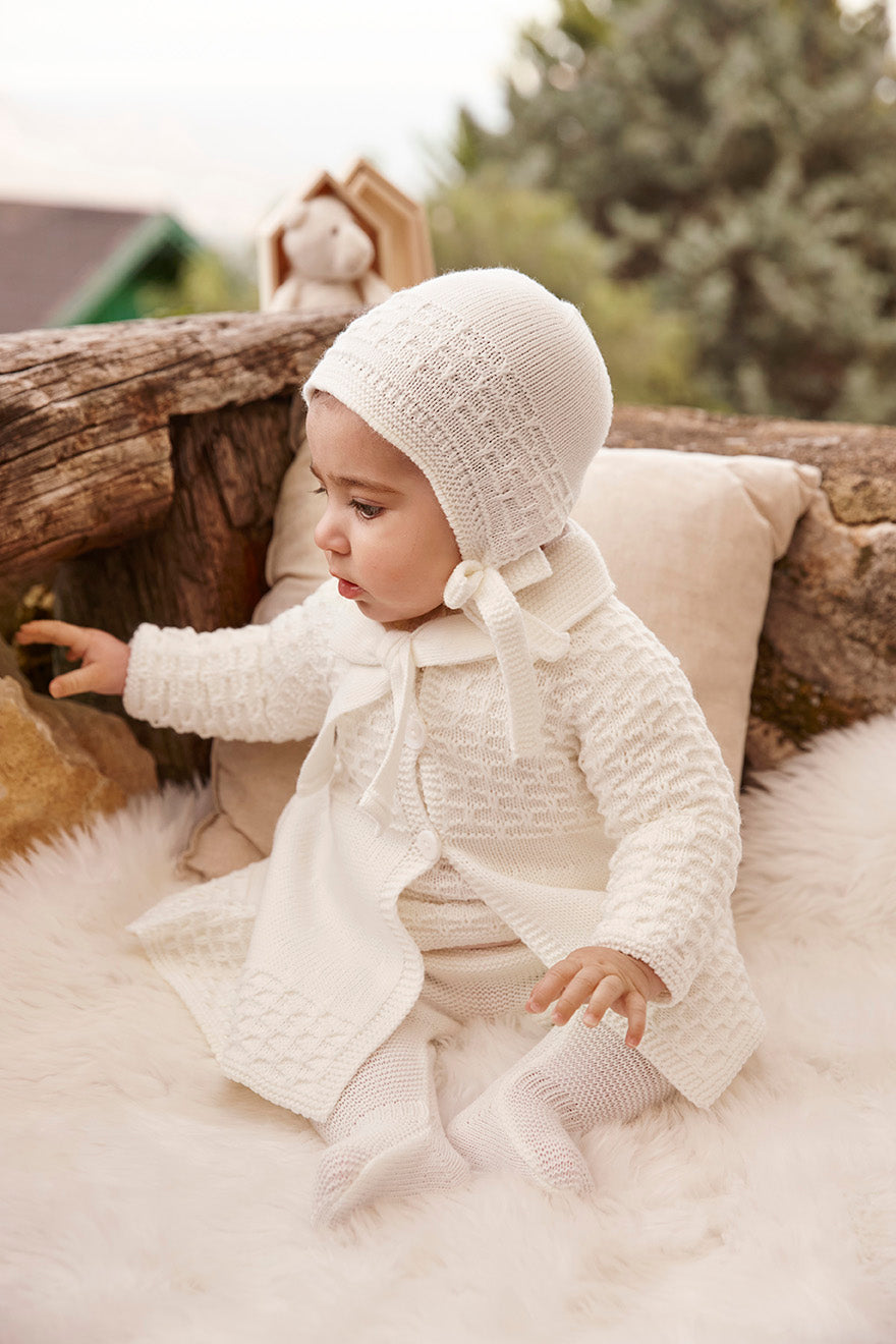 KNITTED COAT WITH GATHERED DETAILS 